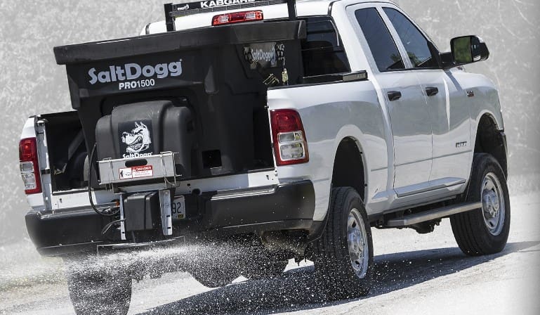 SaltDogg® Pro1500 Salt Spreader on a pickup truck applying salt